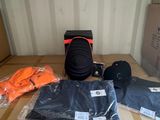 a box with a camera, a hat, and other items on it