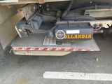 an image of a truck with a trailer attached to it ' s back