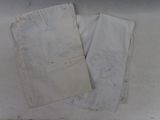 two pieces of paper that have been left on the table