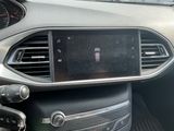 a car dashboard with a digital display in the center