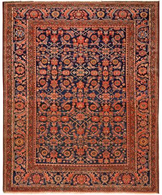 tapis persan ancien à motifs bleus et rouges