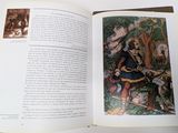 an open book with a picture of a man on a horse
