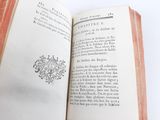 an open book with a picture of a bird on it