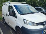 a white van that is parked in a parking lot