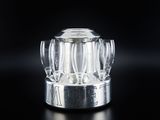 a glass vase that is sitting on a table