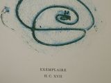 an image of a book with a drawing of a spiral on it