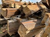 a pile of wood sitting on top of a pile of rubble