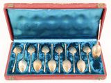 a box with a set of silver spoons and spoon spoons in it