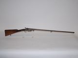 a gun that is sitting on top of a table