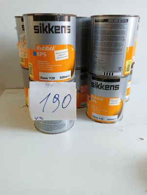 several tins of paint sitting on top of a table next to each other