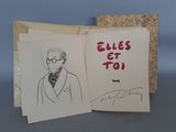 un livre ouvert sur lequel figure le dessin d'un homme en costume-cravate