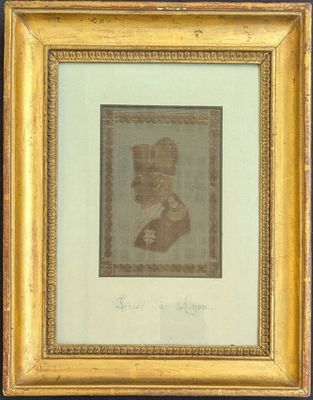 an old picture of a man with a hat and a beard in a gold frame