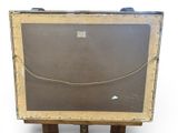 painting on easel with a blackboard on top of it on a white background
