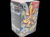 a box of pokemon trading cards on a black background