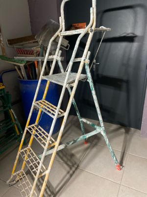 a ladder that is leaning against the wall