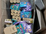 a cart full of food and other items in it