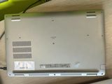 a laptop that is sitting on a desk with a keyboard