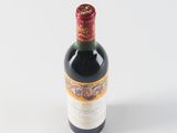 a bottle of wine that is sitting on a table