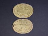 two gold coins with the names of different countries on them