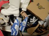 a box full of shoes and a pair of shoes