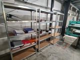 a room with a lot of shelves in it