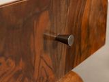 a close up of a piece of wood on a table