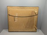 an old picture of a box with a chain hanging from it ' s side