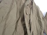 a jacket and pants sitting on a table