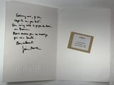 a card with a handwritten poem on it and a picture of a picture of a man