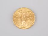 an image of a gold coin on a white surface