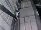 a seat in the back of a car that is empty