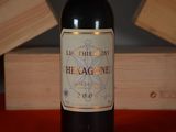 a bottle of wine that is sitting on a table