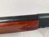 the rifle is laying on a clear plastic case
