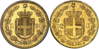a gold coin with a crown and shield on it