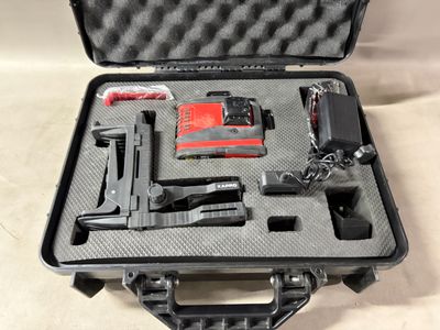 a black case with a gun and other items in it