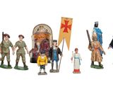 de nombreuses figurines représentant différentes personnes rassemblées