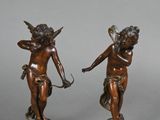 paire de figurines anciennes en bronze représentant Cupidon et Cupidon tenant un arc