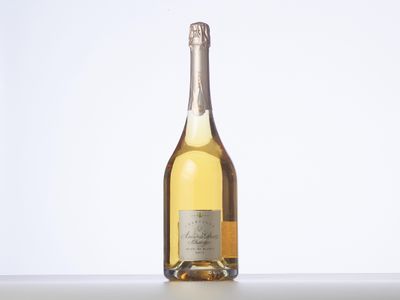 a bottle of wine that is sitting on a table