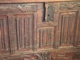 an old wooden chest with carvings on it