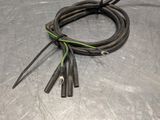 a close up of a bunch of wires on a metal surface