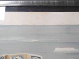 a painting on the wall of a bathroom with a blue and white tile