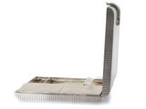 a metal comb that is sitting on top of a table