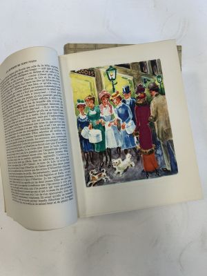 an open book with a picture of a group of people and a dog