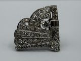 an image of a brooch with diamonds on it