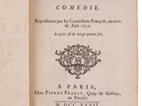 an old book opened to a page with a picture of the title