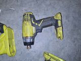 two corded drills and a corded cord are laying on the floor