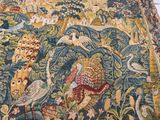 an image of a tapestry with birds and flowers on it