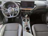 a picture of the interior of a car with the steering wheel down