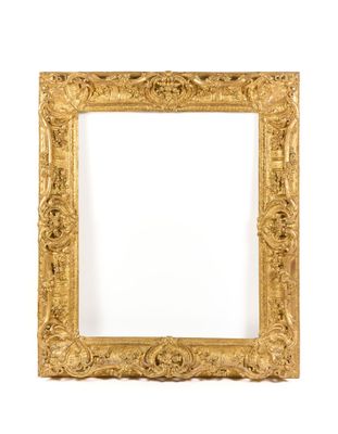 an antique gold frame with a white background and a white background