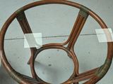 a glass table with a wooden base and a glass top